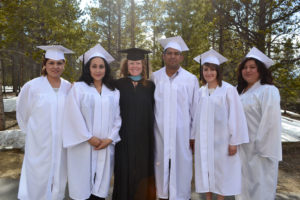 photo - Kelli McCall with graduates