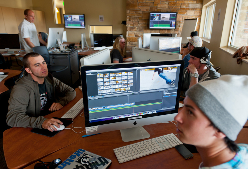 photo - students edit video in a Ski and Snowboard Industry media and marketing class