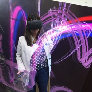 photo - a CMC art instructor tries a virtual reality painting program