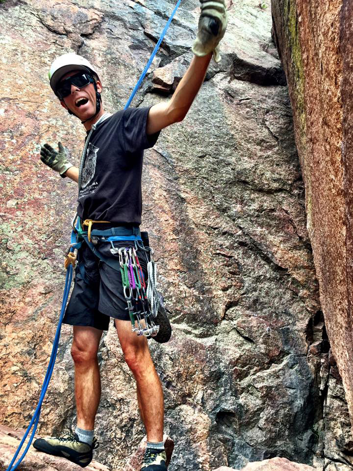 photo - graduate Jere Burrell climbing