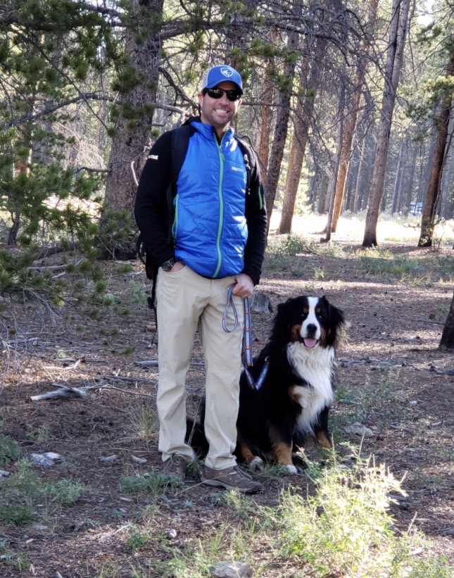 Simon Waldbaum CMC Leadville professor with his dog