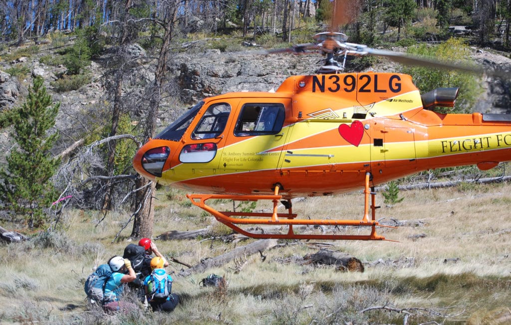CMC Wilderness EMS Certification class training with helicopter in the backcountry.