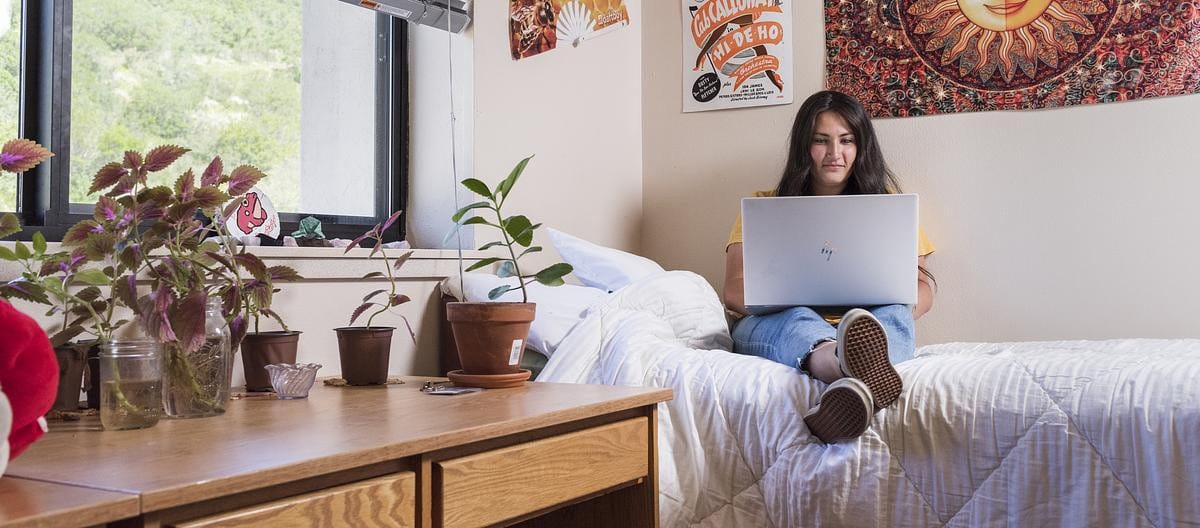 A student in her CMC Steamboat Springs residence hall room.