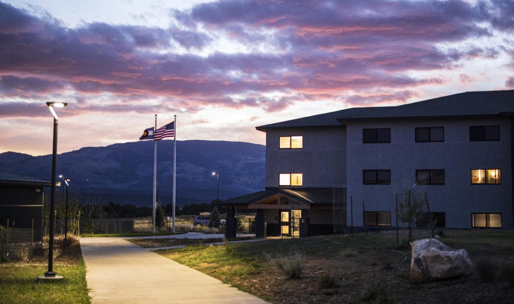 Sopris Hall, the residence hall at CMC Spring Valley, at sunset.