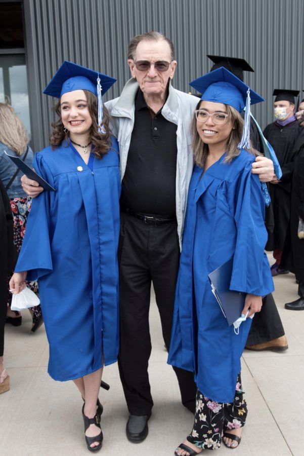 Colorado Mountain College graduates Keanan Bell, left, and Wendy Avila Figueroa, right, flank donor Paul Bushong at the Spring Valley commencement ceremony on May 8. Both students are recipients of the Fast Forward Scholarship created by Bushong. Bell completed her Associate of Applied Science in Veterinary Technology in May, while Avila Figueroa earned her Associate of Science in Paralegal last December.