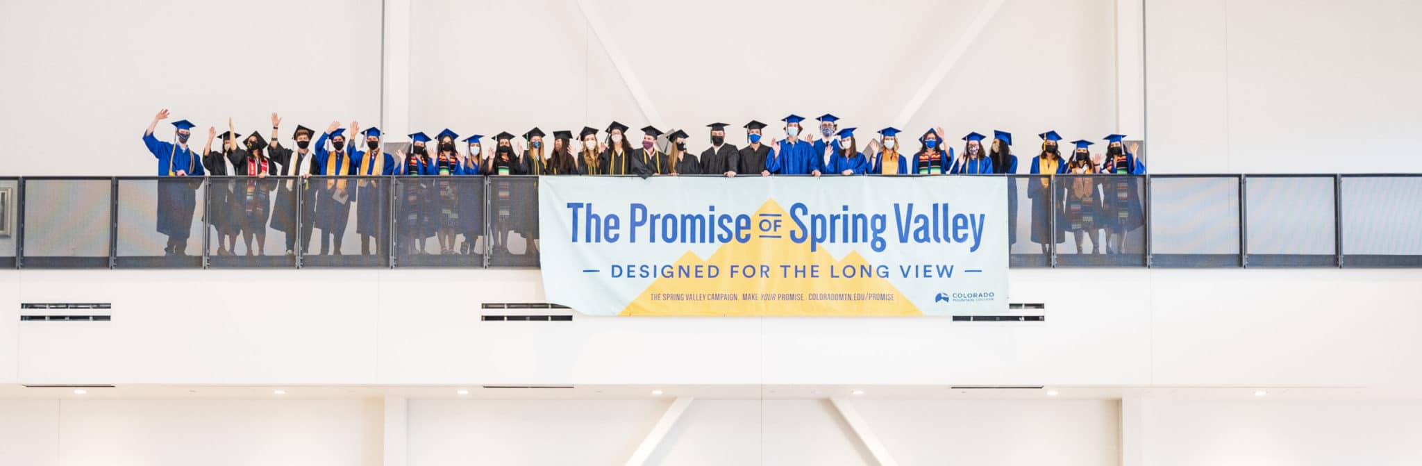 CMC graduates stand by Promise of Spring Valley banner