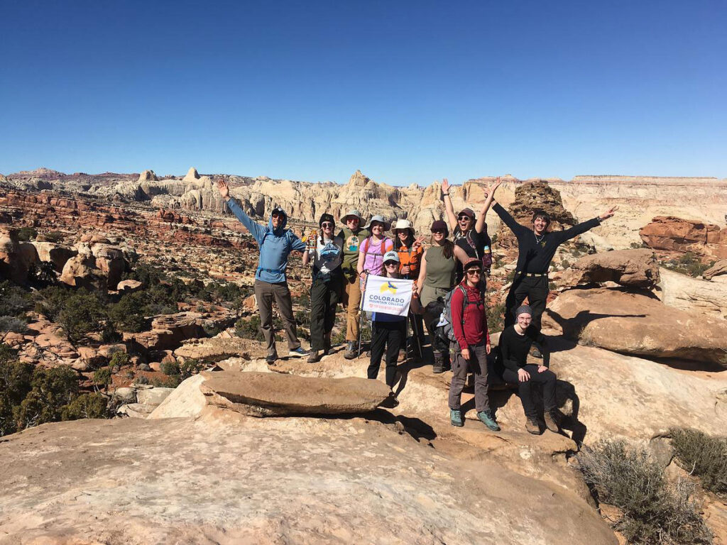 CMC Outdoor Education students and instructors group photo during a desert orientation trip.