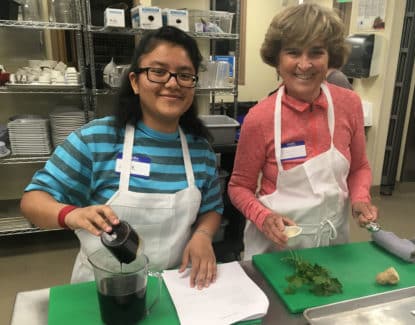Mountain Scholar with her mentor at a cooking class