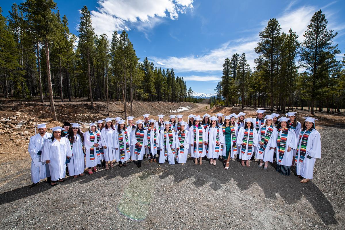 General equivalency diploma graduates pose for a group picture before receiving their diplomas during Colorado Mountain College Leadville’s Spring 2022 commencement ceremony, held in CMC Leadville’s Climax Molybdenum Leadership Center on May 6.