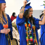 Student celebrating at graduation