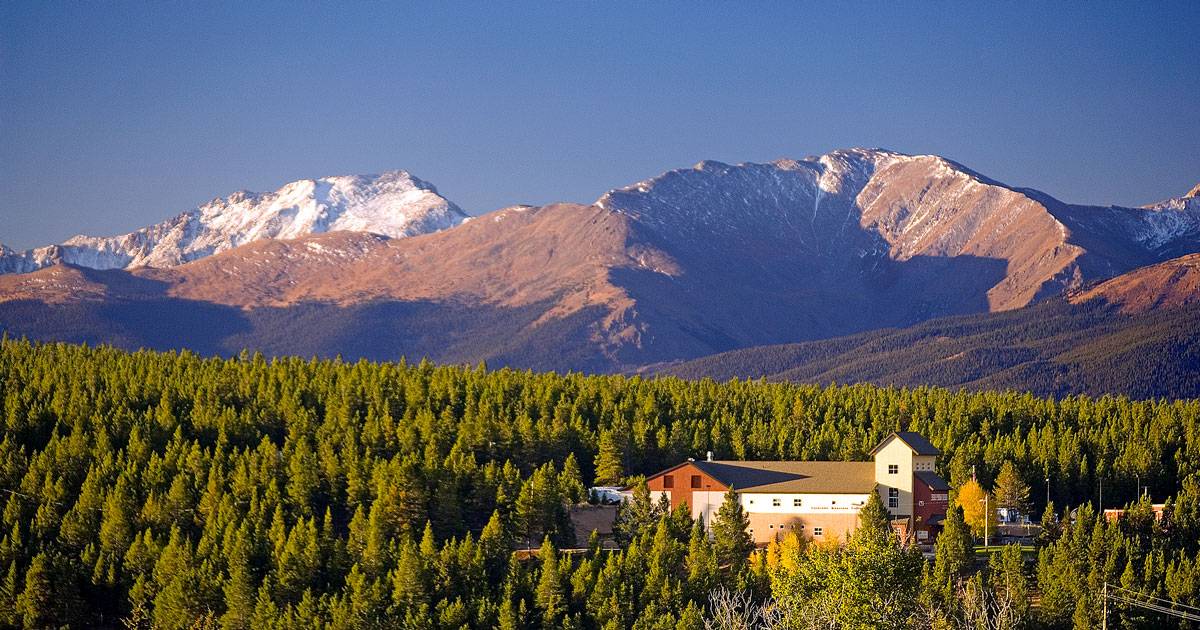 The CMC Leadville campus at dawn with the Sawatch Mountain Range  in the background.